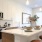 Contemporary kitchen with stainless steel appliances, island, and decorative accents in Lakewood, CO.