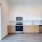 Well-lit, open concept kitchen with up-to-date appliances 