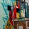 Vibrant street art mural on brick wall in Lakewood, CO.
