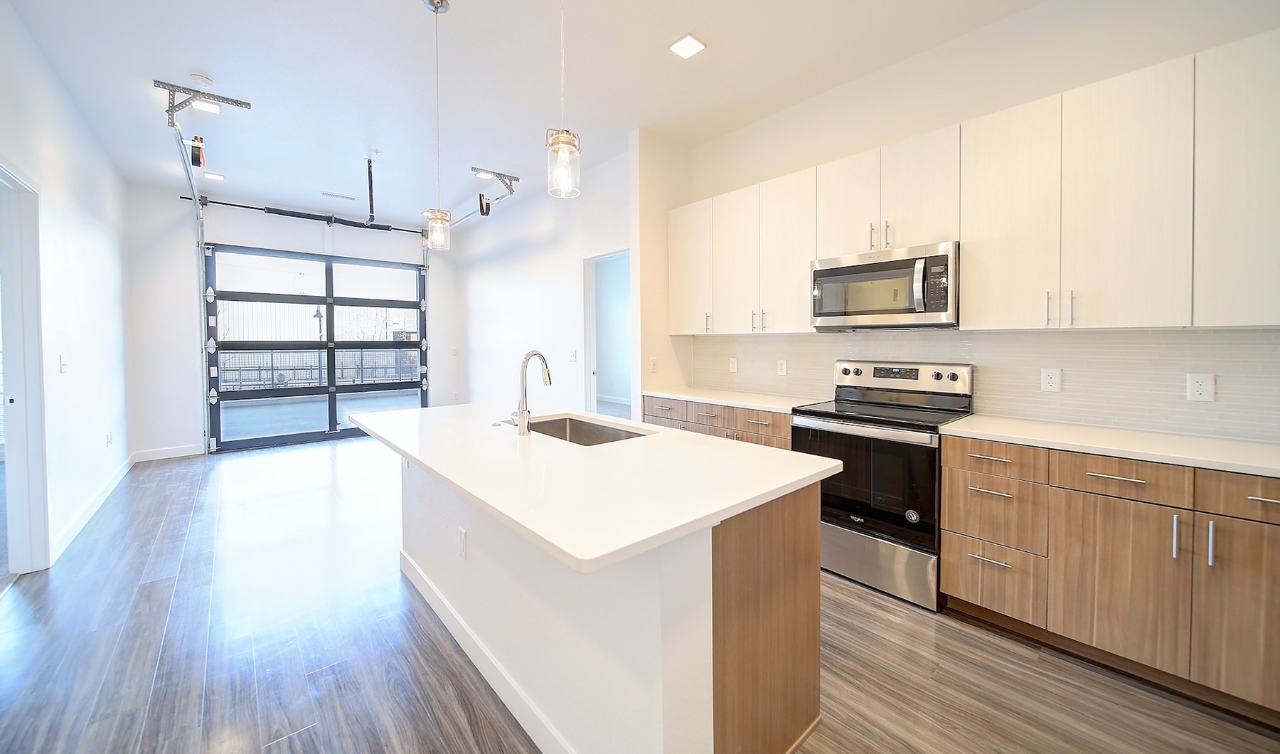 Kitchen Well-lit, open concept kitchen with large island